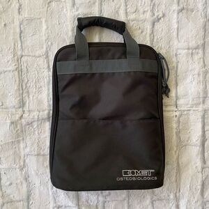 Laptop or work bag w/one main compartment and multiple inner & outer pockets